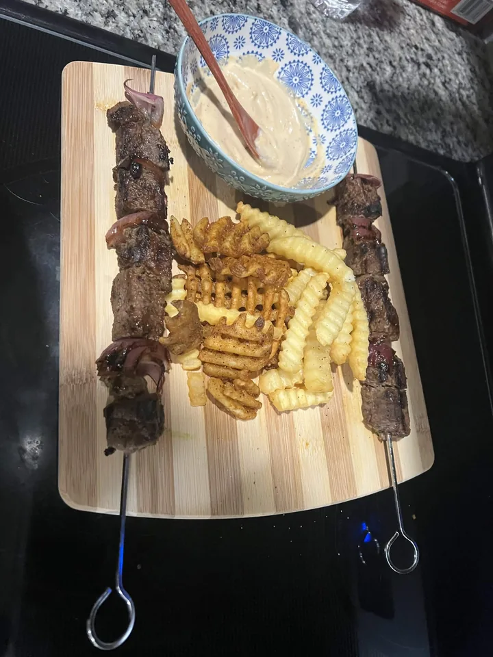 Kebab platter with fries and sauce